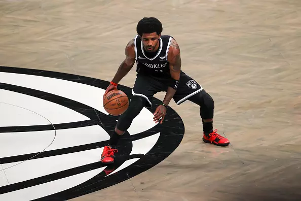 Kyrie Irving Build - Irving practicing his ball handling before a game